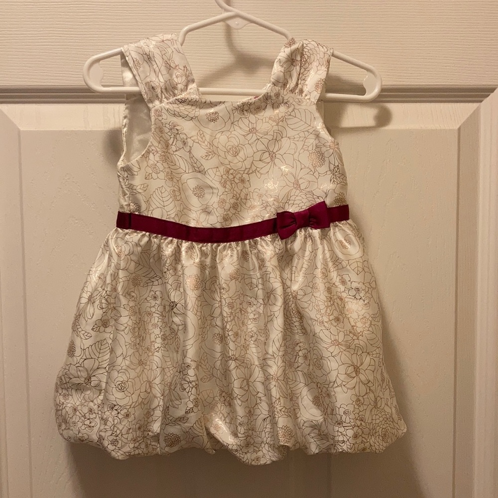 White and gold infant dress with berry accent bow